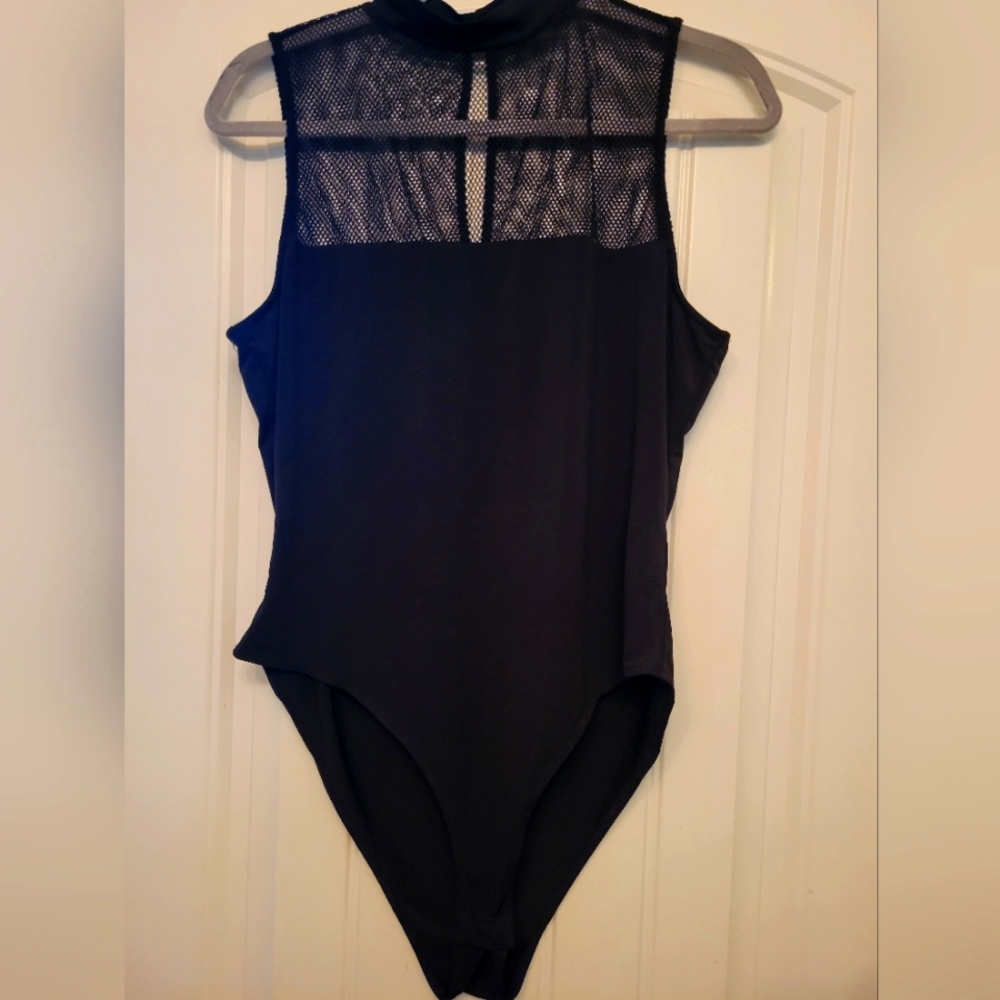 Sleeveless black mesh bosysuit